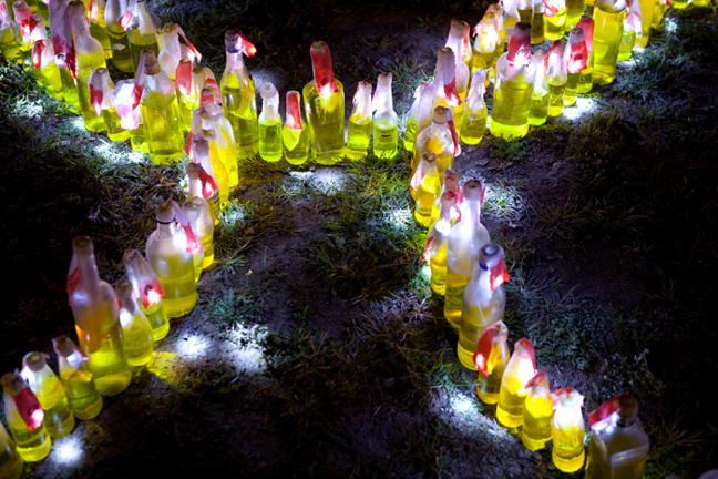 Luzinterruptus: Shunning The Olympic Games with 500 Bottles of Light_3