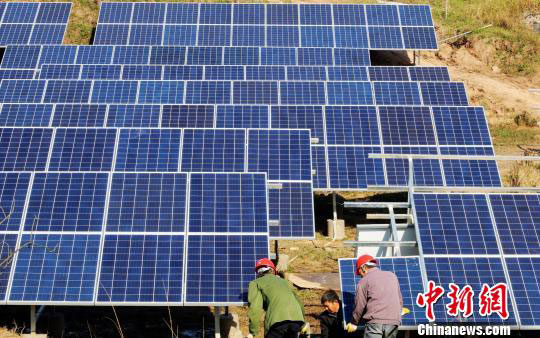 China to Cut Price of Wind Power, PV