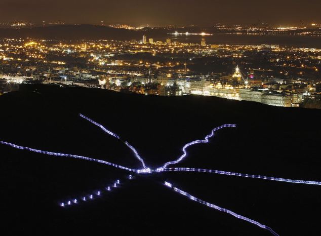 Lighting up Edinburgh: Hundreds of people wear LED lights in practice for opening of city's international festival