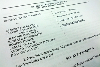 US Charges Eight with Multimillion-Dollar Cybercrime