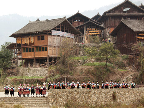 Sipping to Music, Dance and Bull Fights in Miao Village Folk Culture
