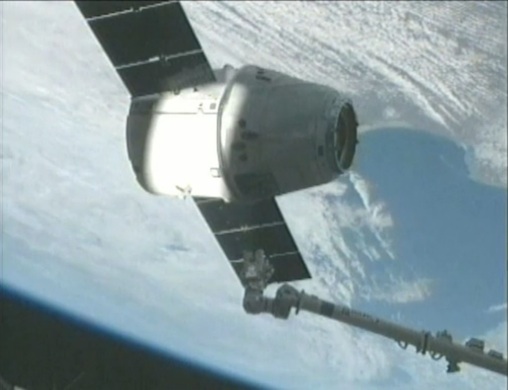 After Robotic Arm Grabs  SpaceX Dragon, Unloading Begins