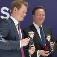 Prince Harry and David Cameron Pick up Makie Dolls - of Themselves